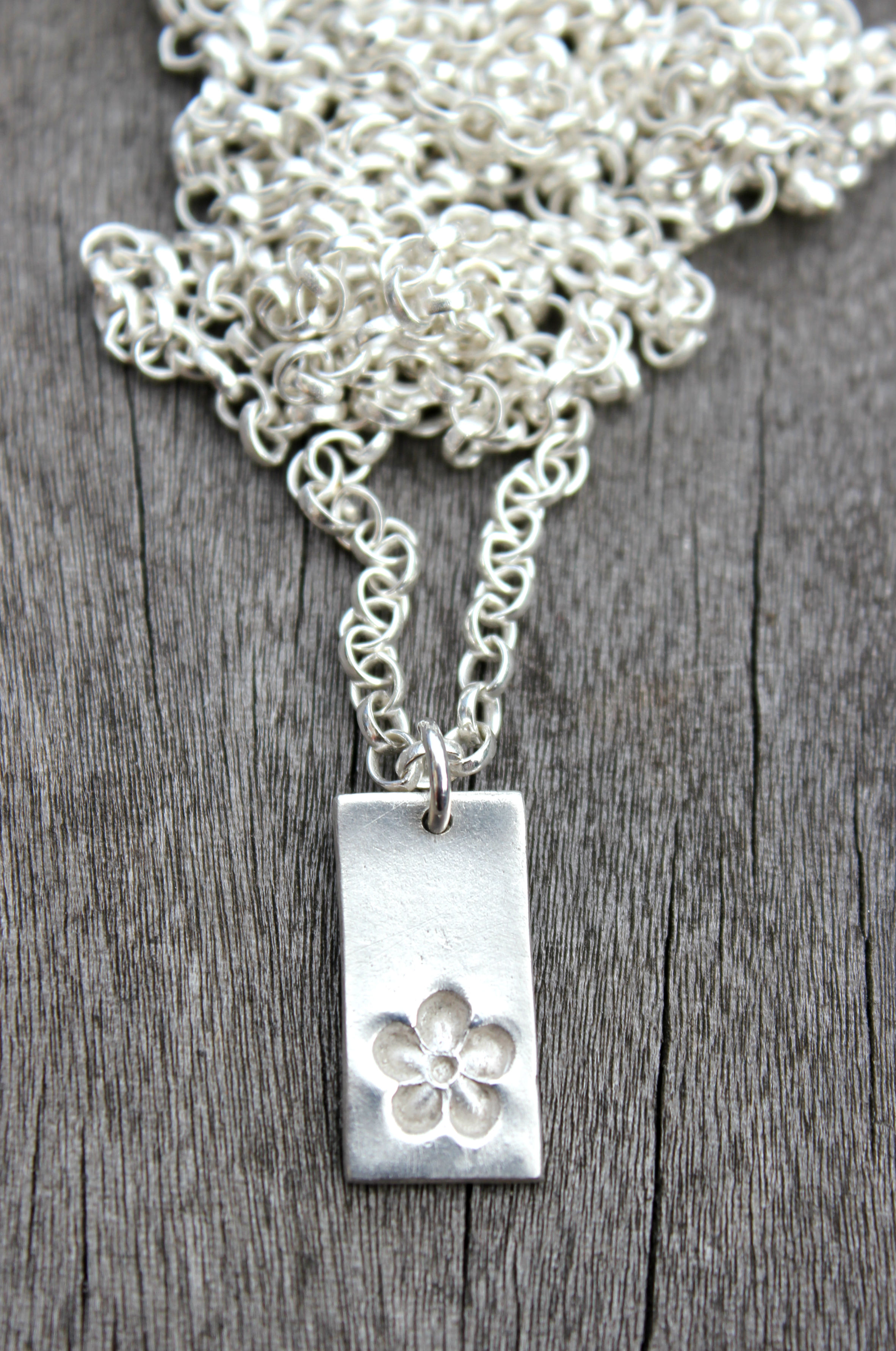 Silver flower pendant by little silver hedgehog.JPG