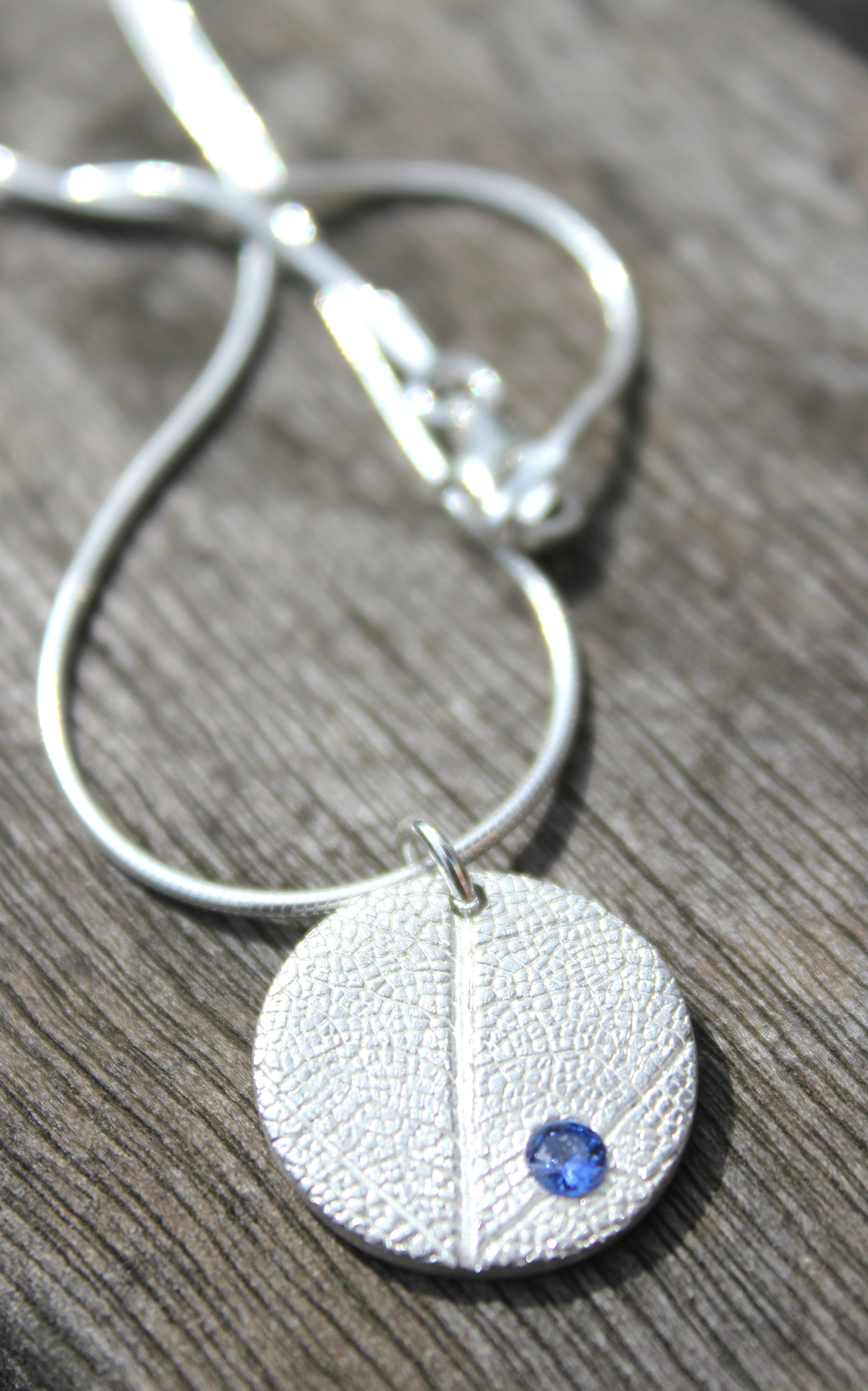 Silver leaf and sapphire pendant by Little Silver Hedgehog