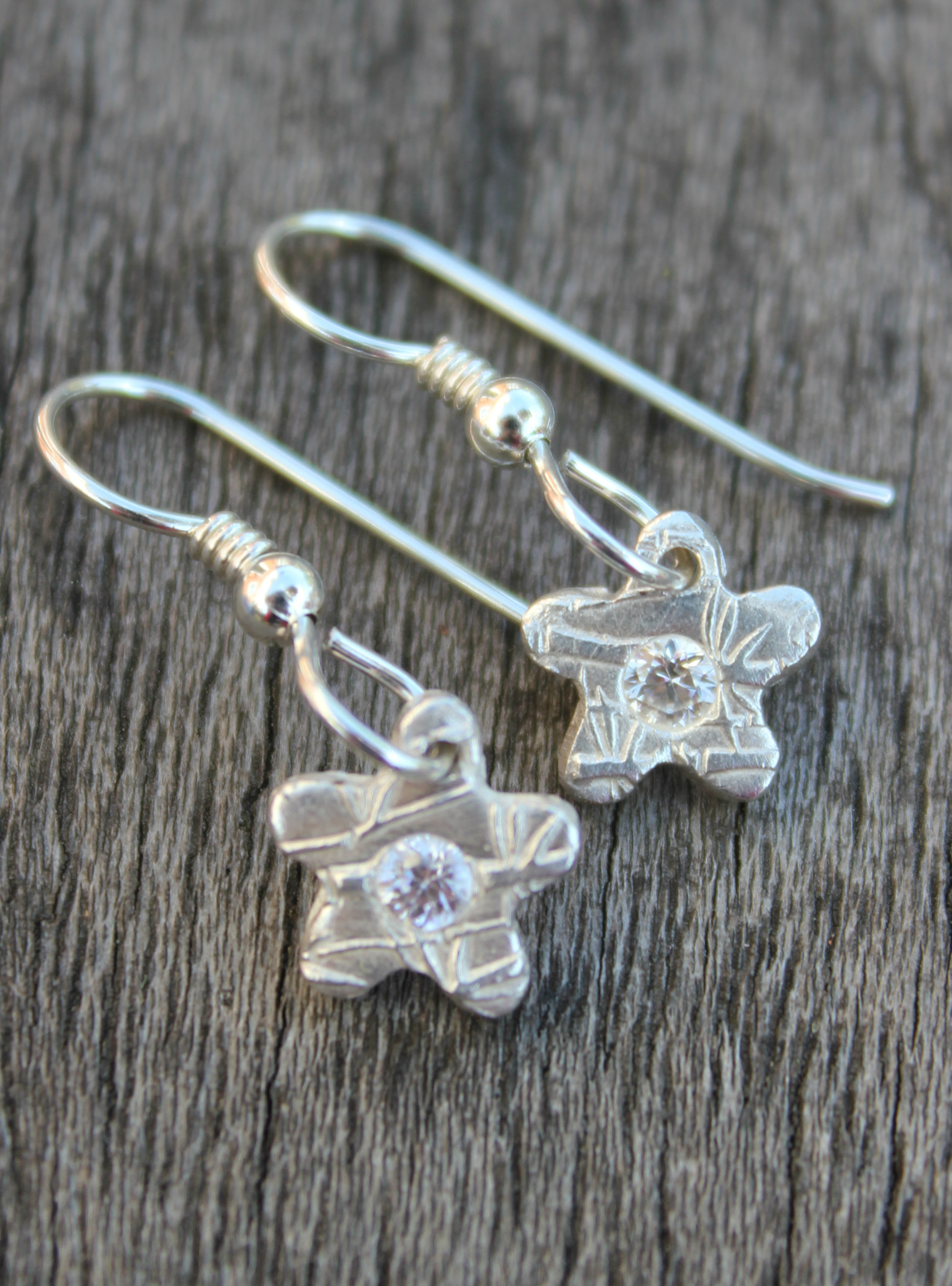 White topaz flower earrings by little silver hedgehog.JPG